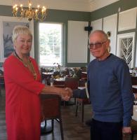 From left to right, Ken Ashmore and Chris  Cocklin of The Rotary Club of St Ives with Andrea Parsons, proprietor of  ' I Should Coco' of St Ives, the competition sponsor with 1st prize winner Daisy Perry.